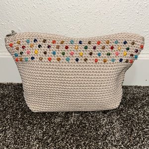 The Sak makeup bag crochet cream